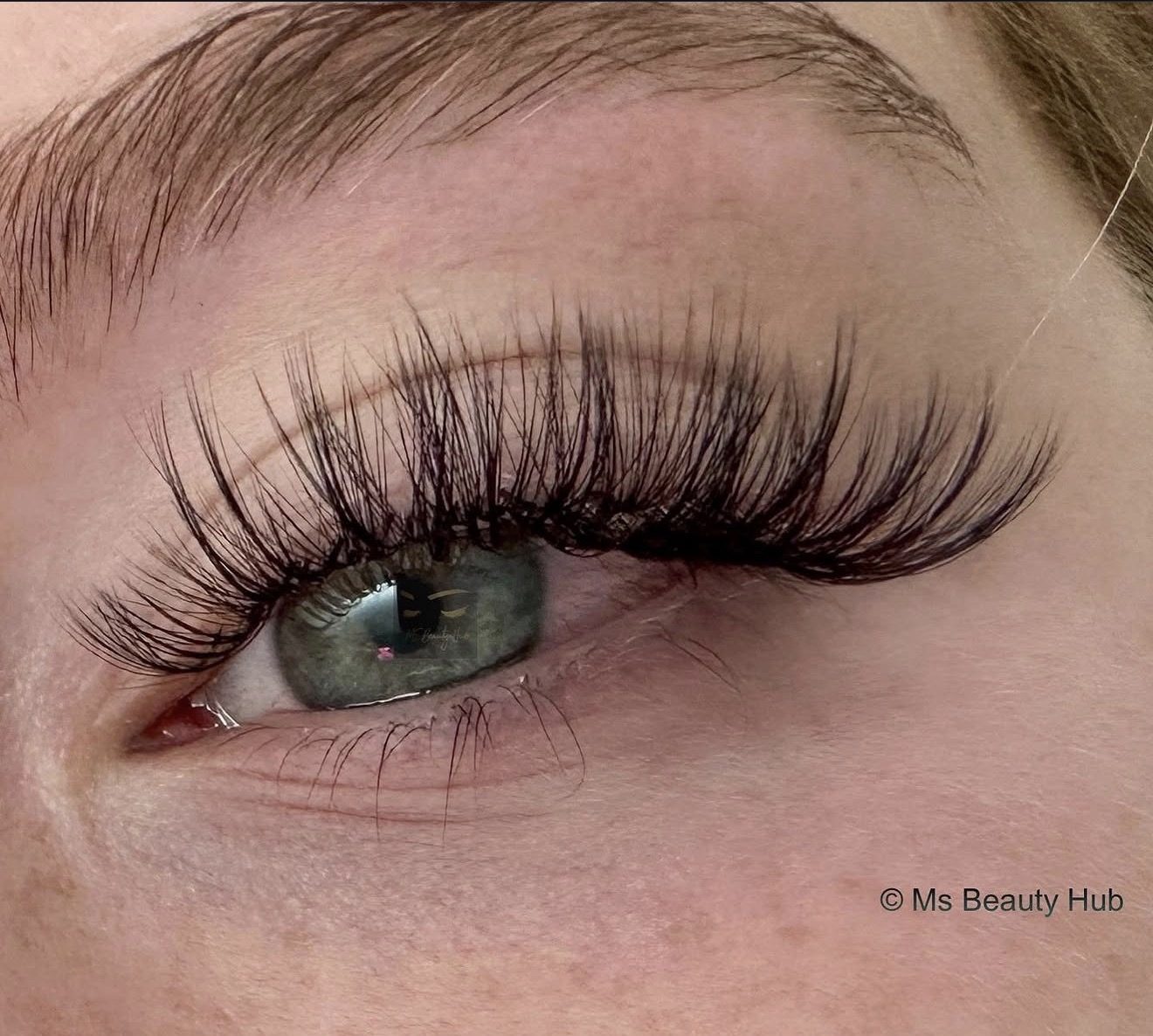 Close-up of a finished set of lash extensions